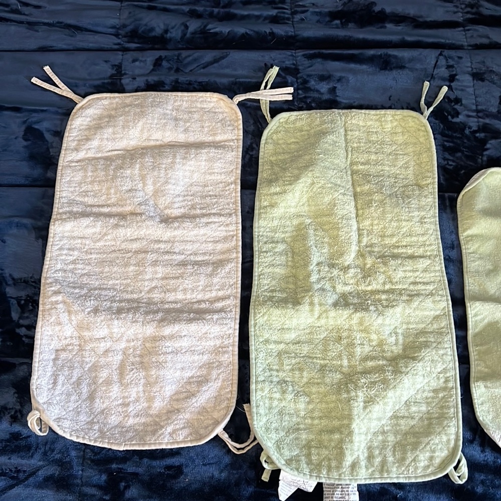 Crib Rail protectors and a mat